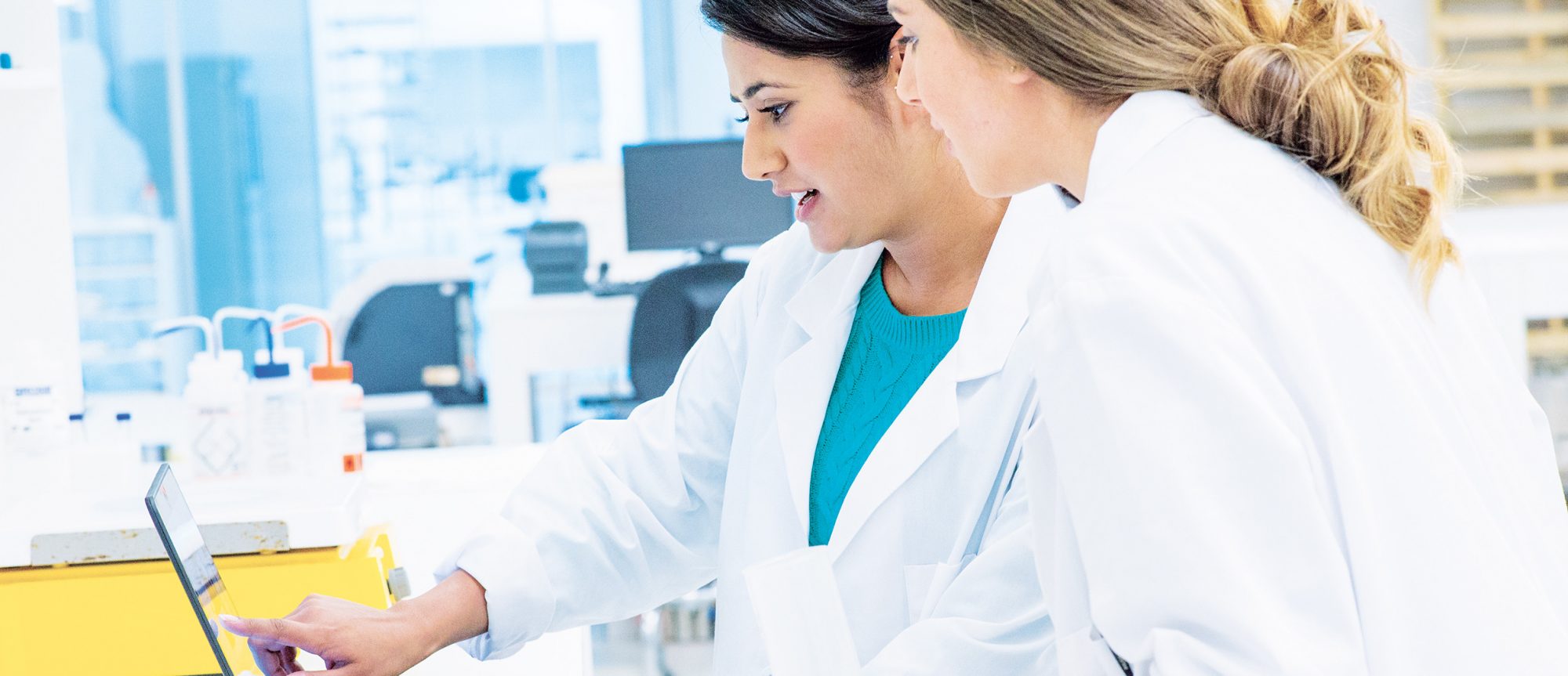 Two people working in Healthcare with a Windows device