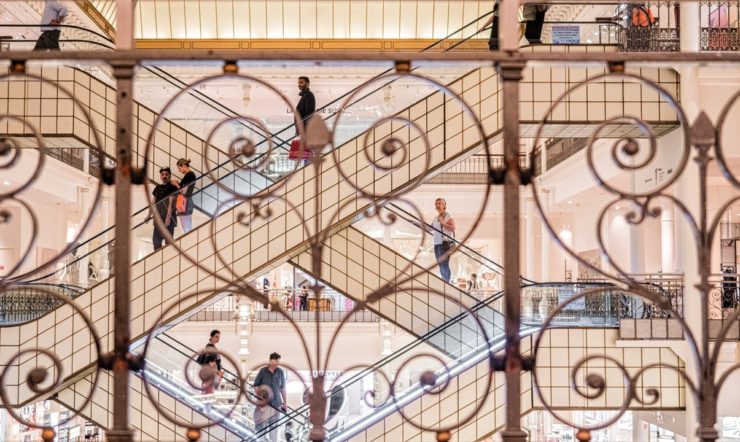 People walking up and down the stairs