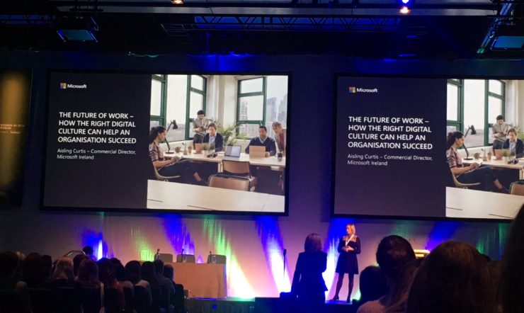 Aisling Curits on a stage in front of a crowd