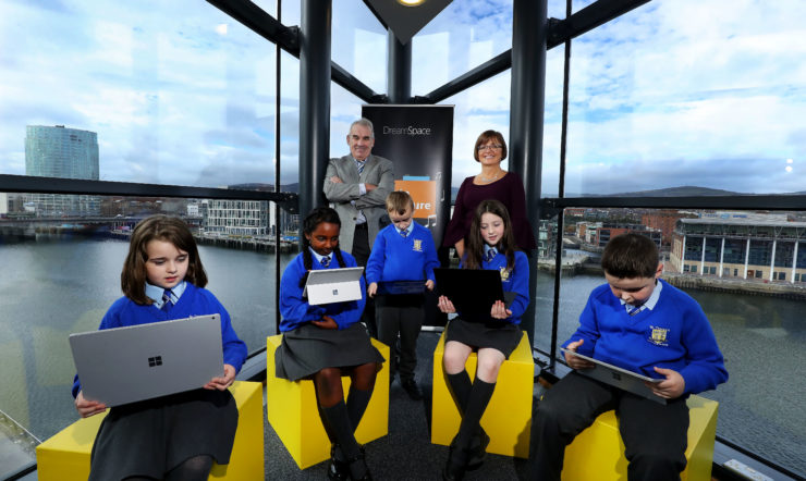 a group of people sitting on a bench