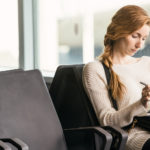 SMB employee working remotely from an airport