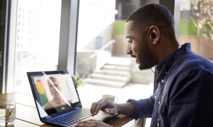 a man using a laptop computer