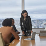 Three people with Surface devices