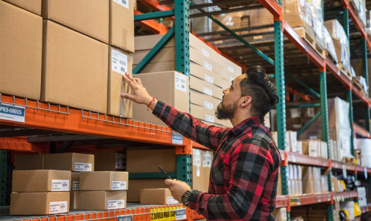 a man standing in front of a store