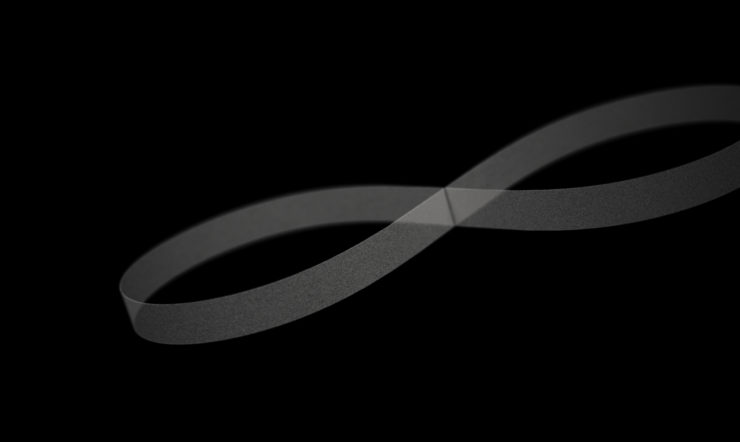 A white infinite loop on a black background, representing the continuous flow of data in a digitally transformed organization