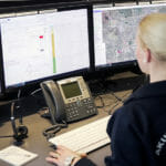 A person monitoring emergency calls