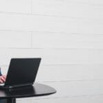 A woman working with a laptop