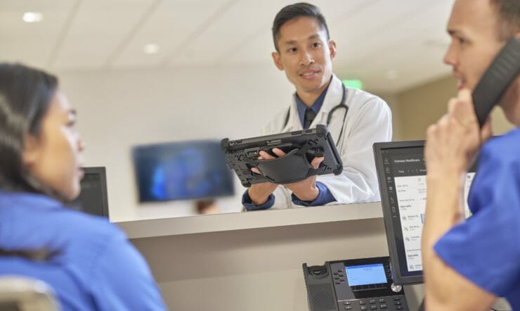 three people talking