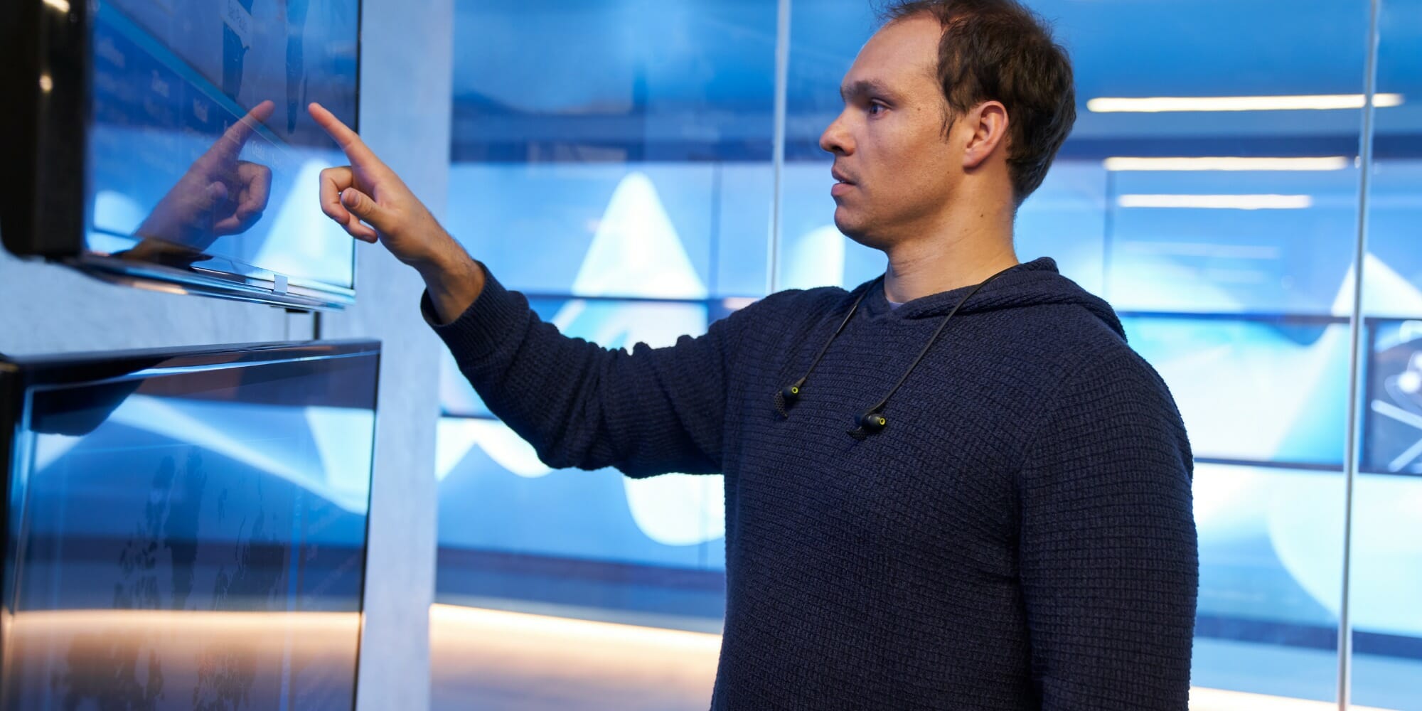 man working in security center