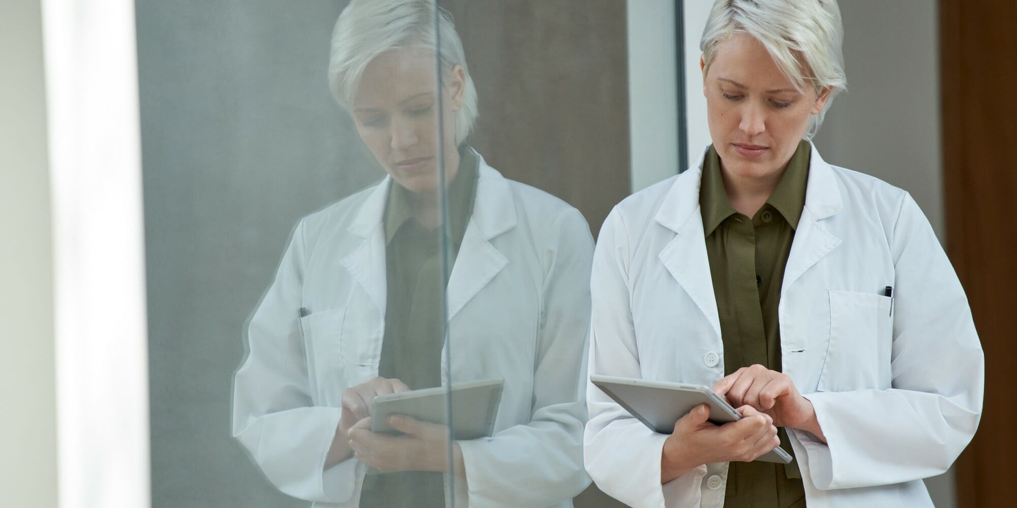 doctor holding surface laptop