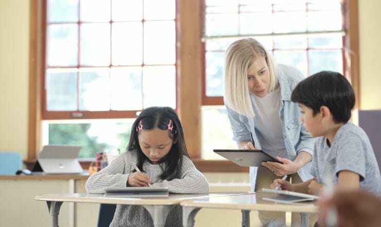 Teacher with students