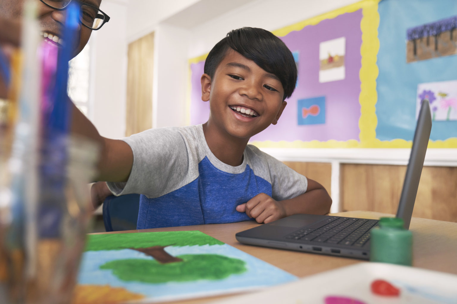 Student smiling in the classroom