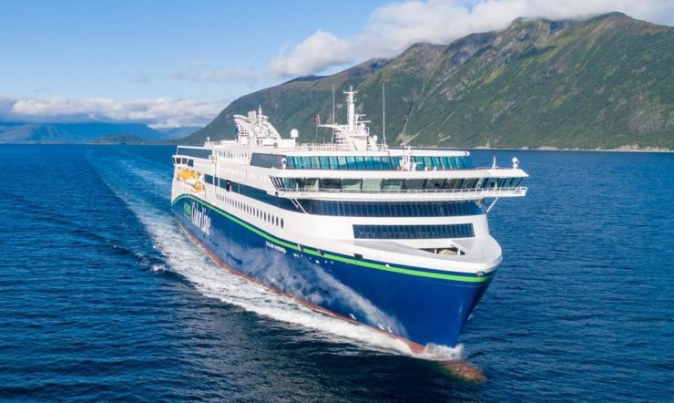 A cruise ship in a fjord