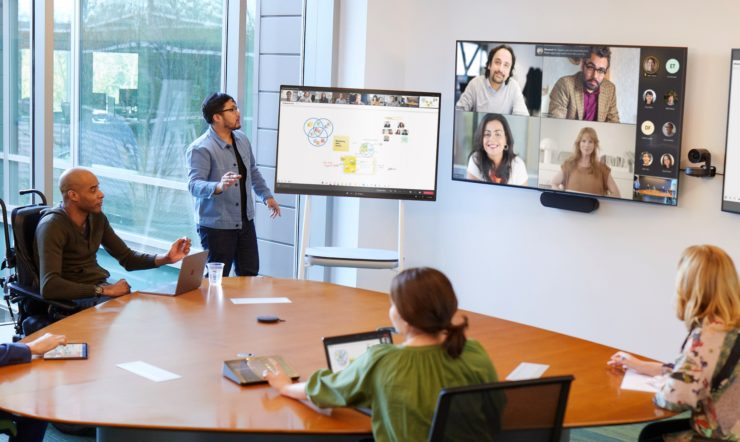 People looking at a screen