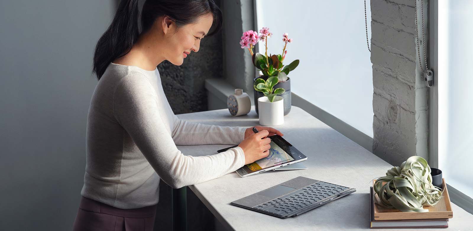 Woman with Surface tablet