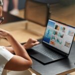 A woman looking at a computer