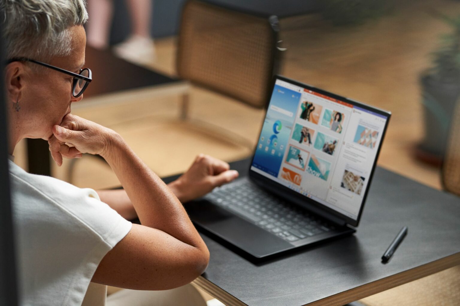 A woman looking at a computer