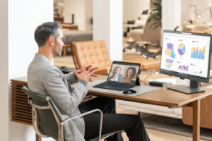 Man with Surface second screen and Teams