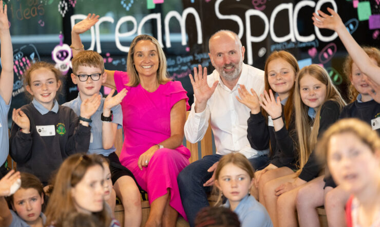 several people in different age waving