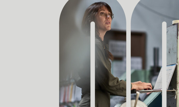 A woman working with a laptop